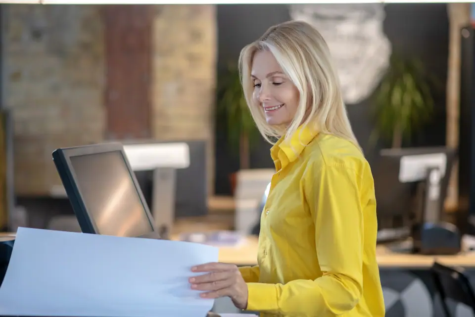 Business owner working on her plan at her desk